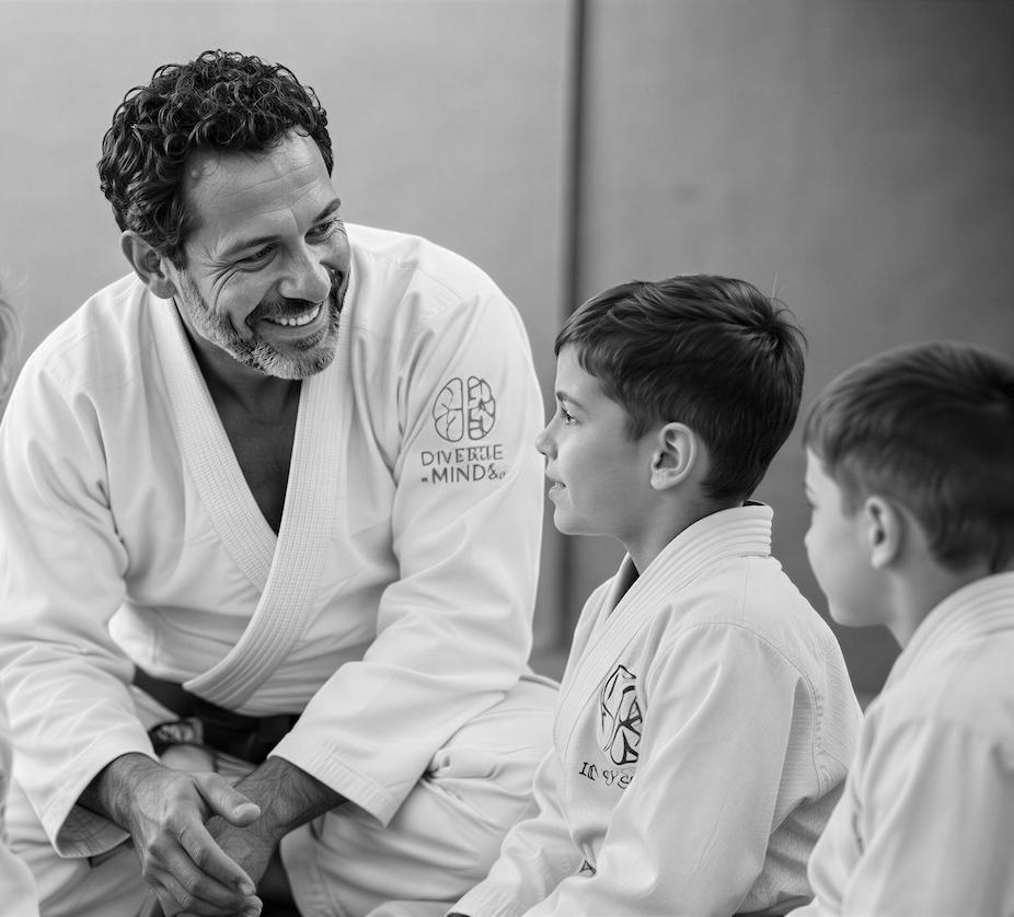 Black-and-white photo of a young student mid-movement on the Jiu-Jitsu mat, focused and calm, with a subtle brand-color accent on the belt